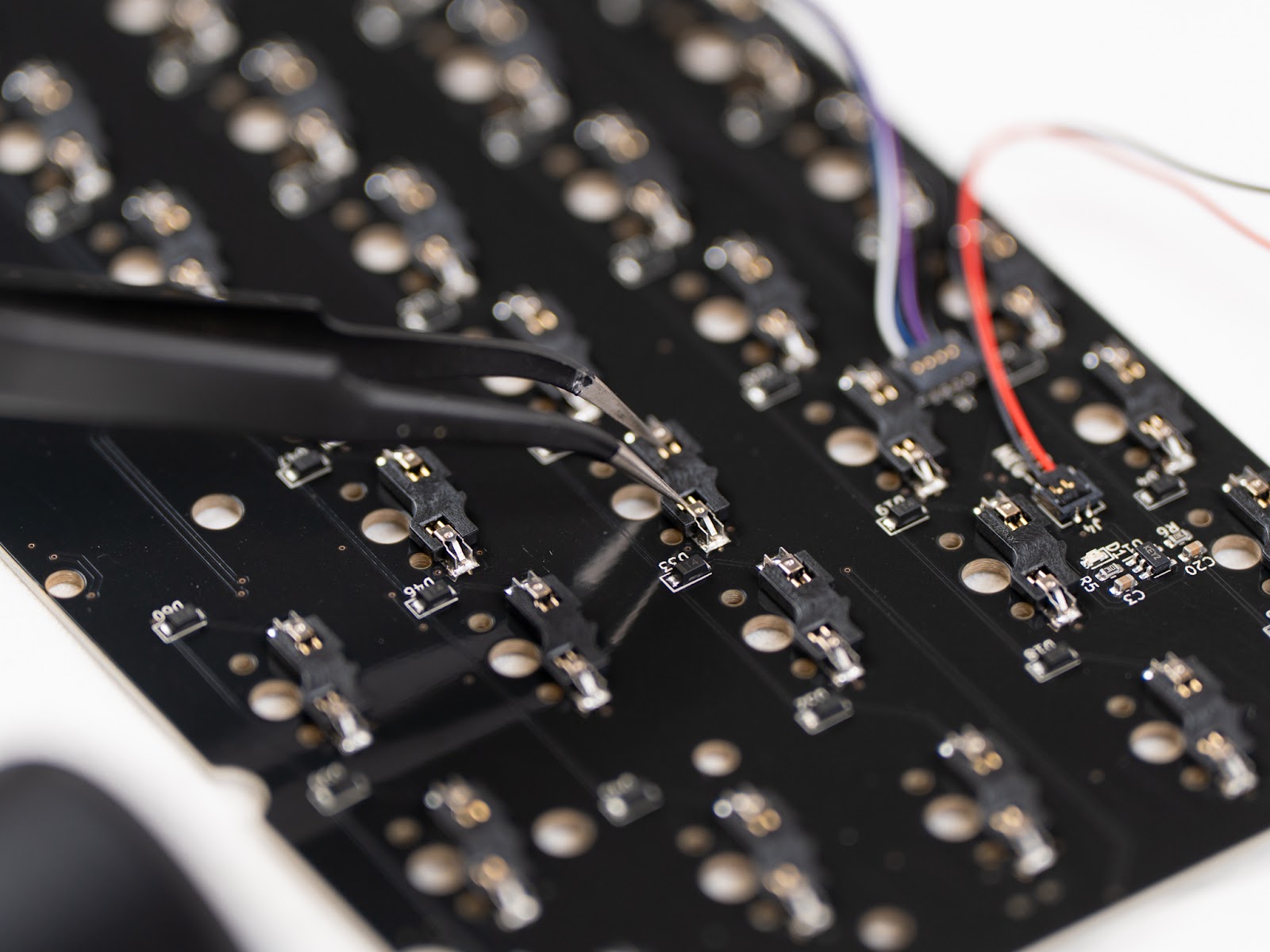 Testing PCB with tweezers