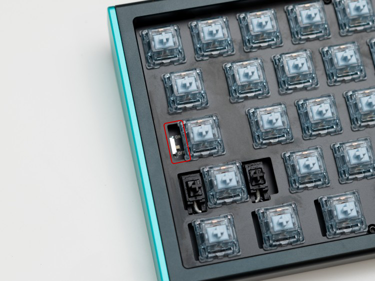 Battery toggle switch location